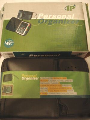New black personal organizer, calculator, pen