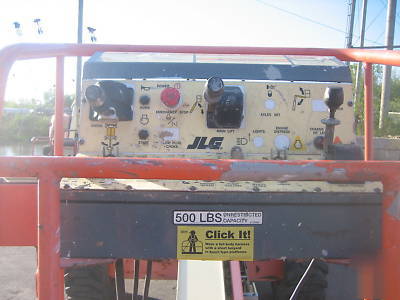 Jlg 60H 4WD dual fuel boomlift runs great jlg boom 
